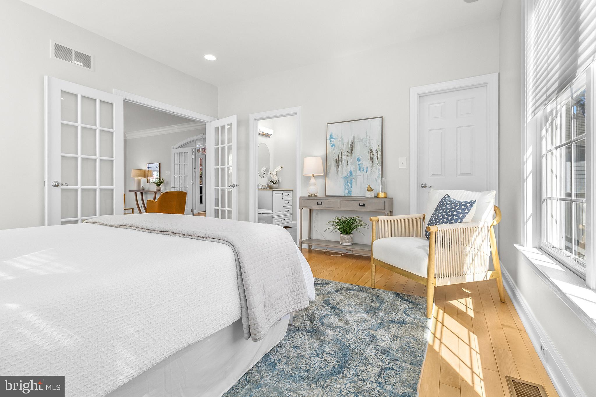 4 Greystone Circle Newtown Square, PA 19073 - Photo 17 of 51 a spacious bedroom with a bed and a large window