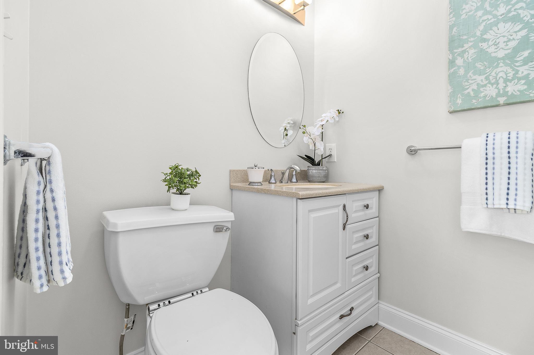 4 Greystone Circle Newtown Square, PA 19073 - Photo 18 of 51 a bathroom with a toilet sink and mirror