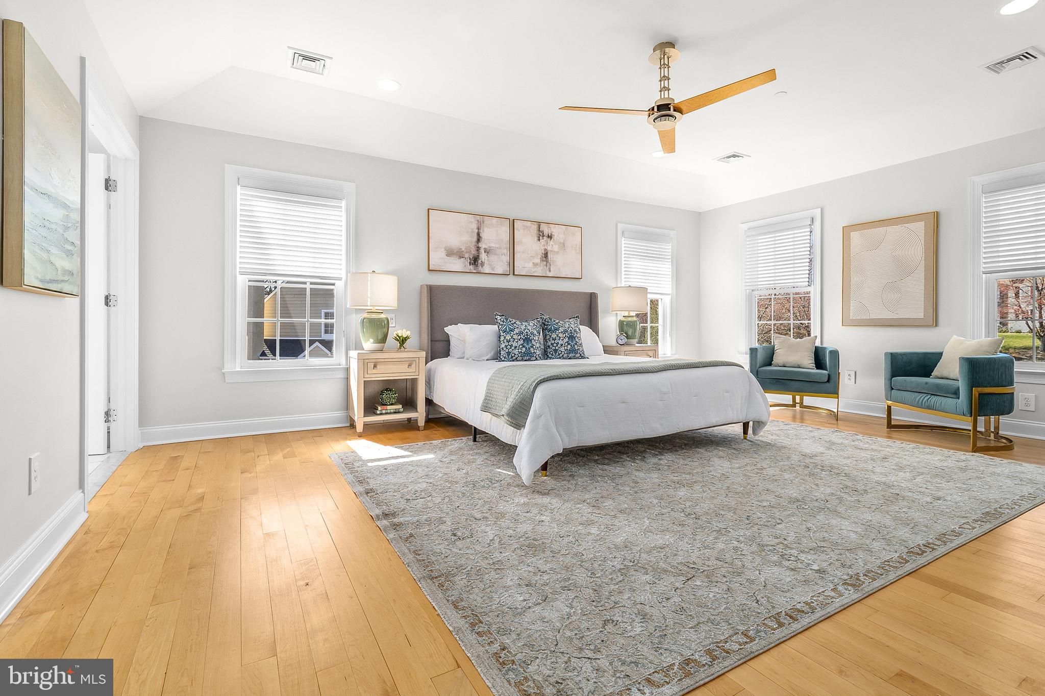 4 Greystone Circle Newtown Square, PA 19073 - Photo 19 of 51 a spacious bedroom with a bed a dresser and a window