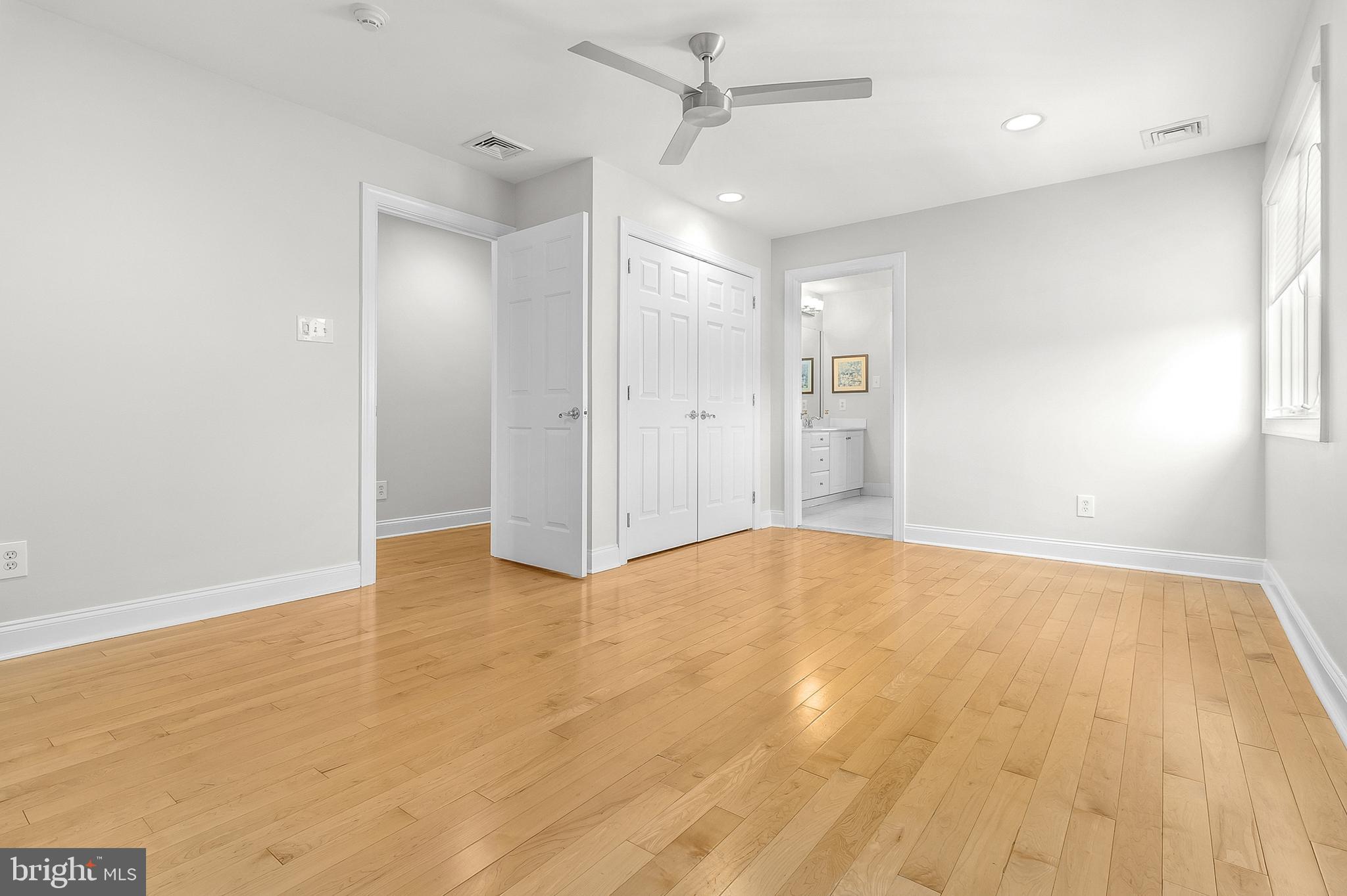 4 Greystone Circle Newtown Square, PA 19073 - Photo 23 of 51 an empty room with wooden floor and windows