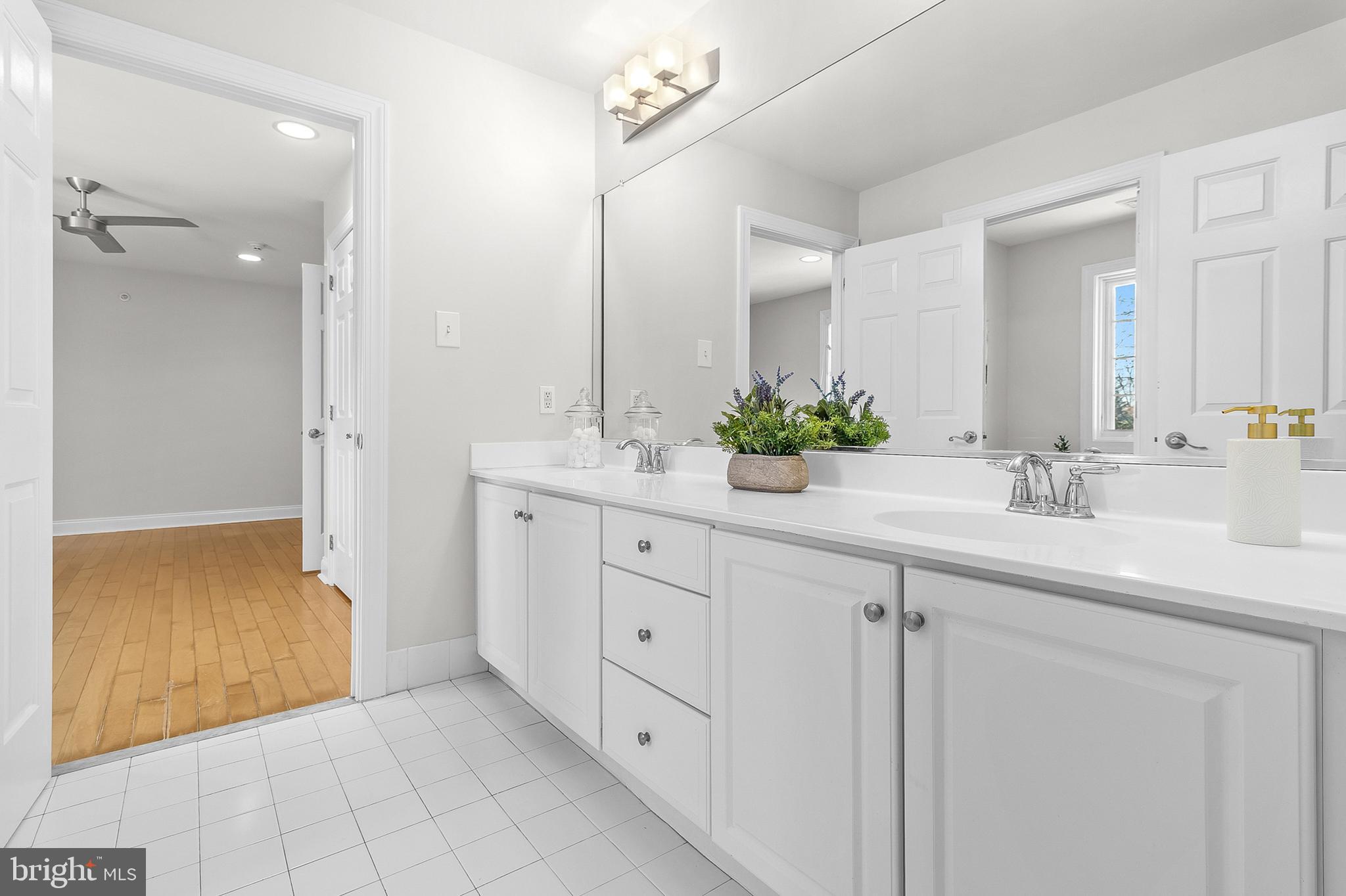 4 Greystone Circle Newtown Square, PA 19073 - Photo 24 of 51 a bathroom with a double vanity sink mirror and double