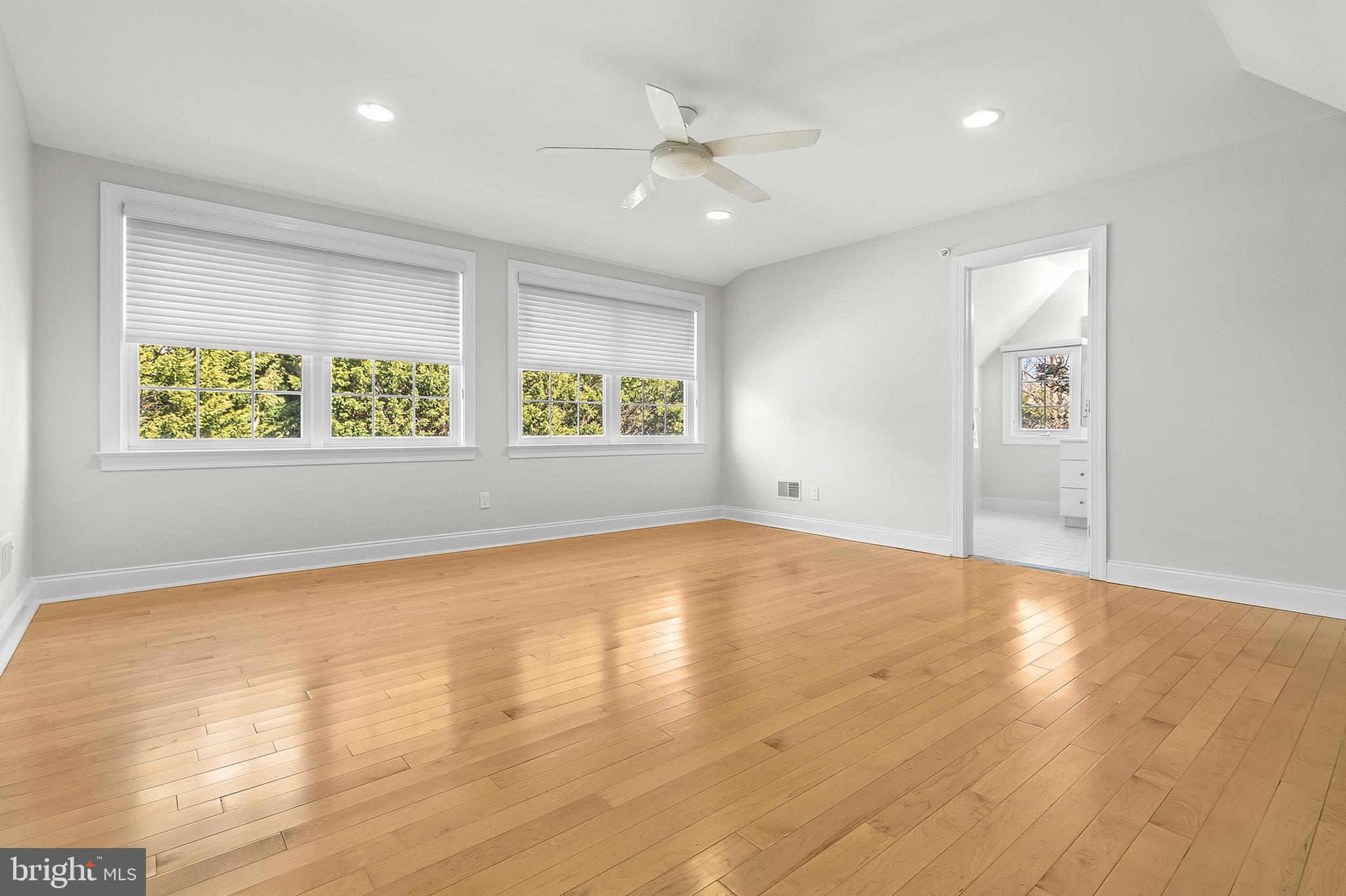 4 Greystone Circle Newtown Square, PA 19073 - Photo 27 of 51 an empty room with wooden floor and windows