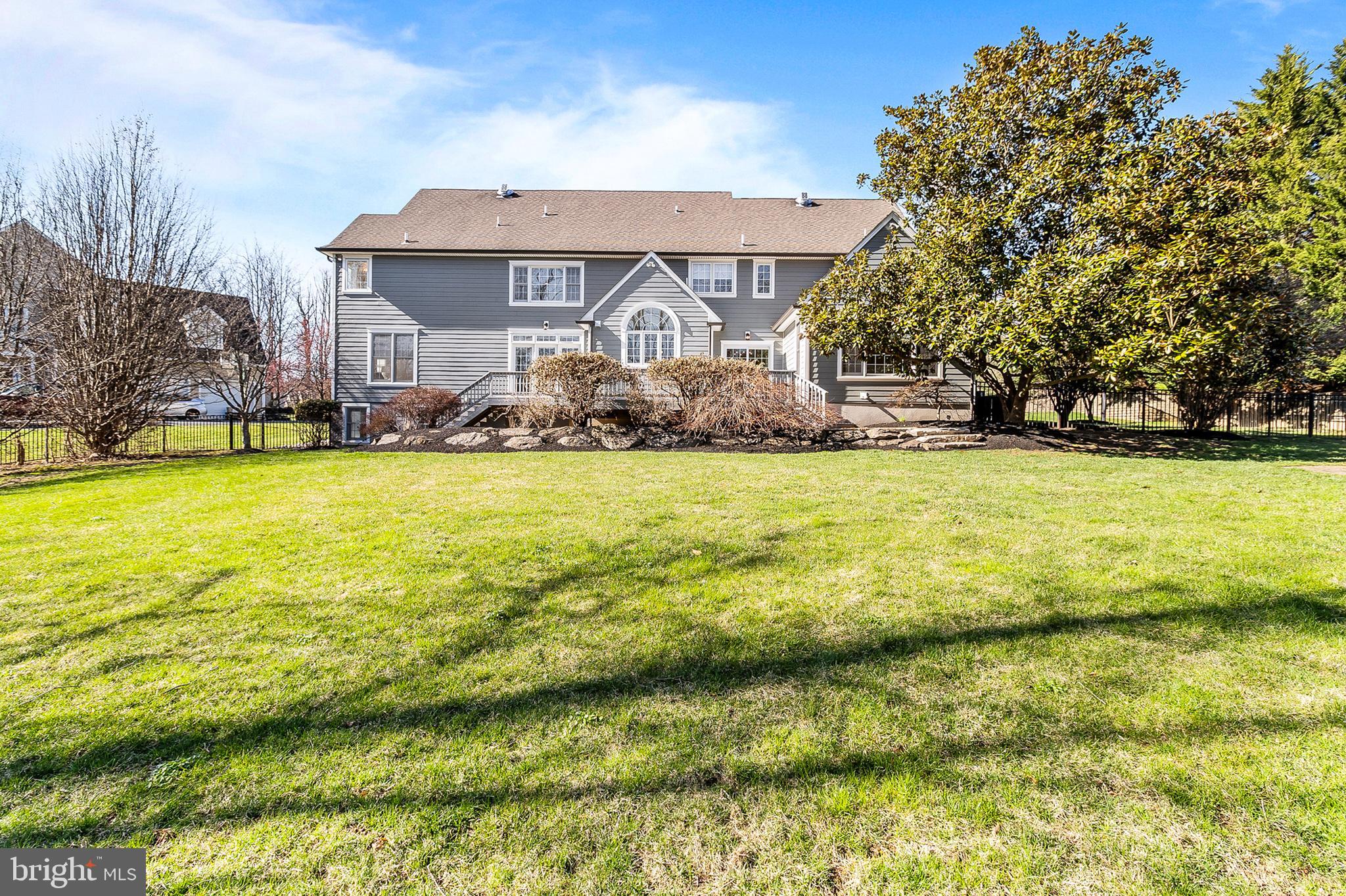 4 Greystone Circle Newtown Square, PA 19073 - Photo 41 of 51 a view of a house with swimming pool and a yard