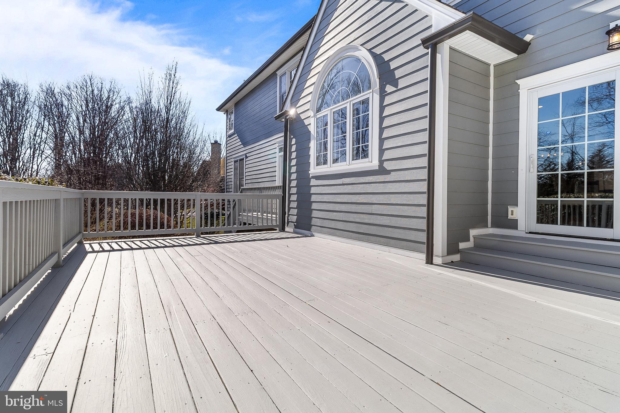 4 Greystone Circle Newtown Square, PA 19073 - Photo 43 of 51 a view of backyard with deck and wooden floor