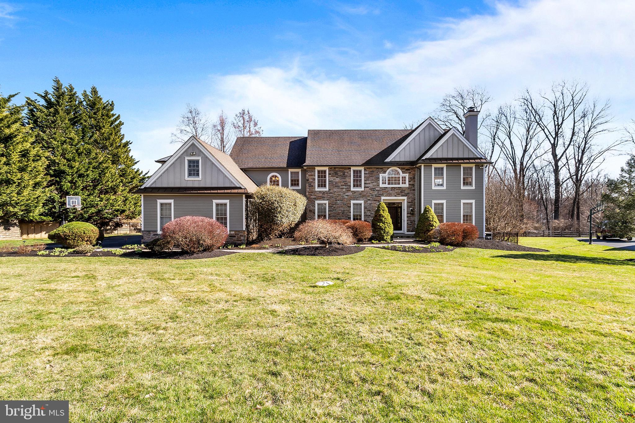 4 Greystone Circle Newtown Square, PA 19073 - Photo 47 of 51 a front view of a house with a yard