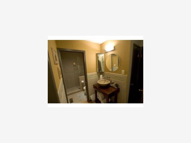 145 Ware Road Woodside, CA 94062 - Photo 8 of 8 a picture of a bathroom with a sink and mirror