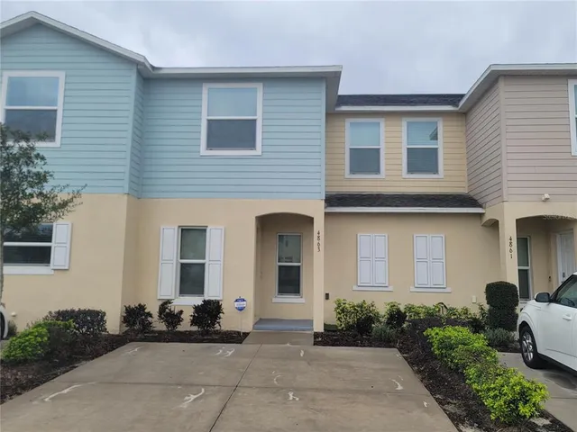 a front view of a house with an outdoor space