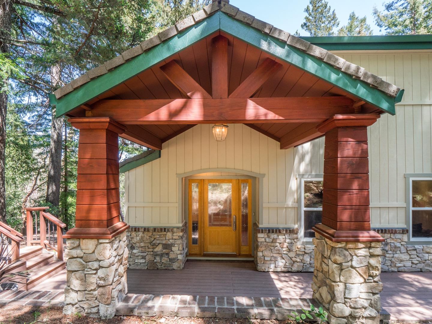 a front view of a house with garden