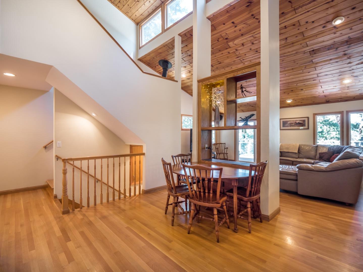 18635 Favre Ridge Road Los Gatos, CA 95033 - Photo 21 of 74 a view of a dining room with furniture and wooden floor