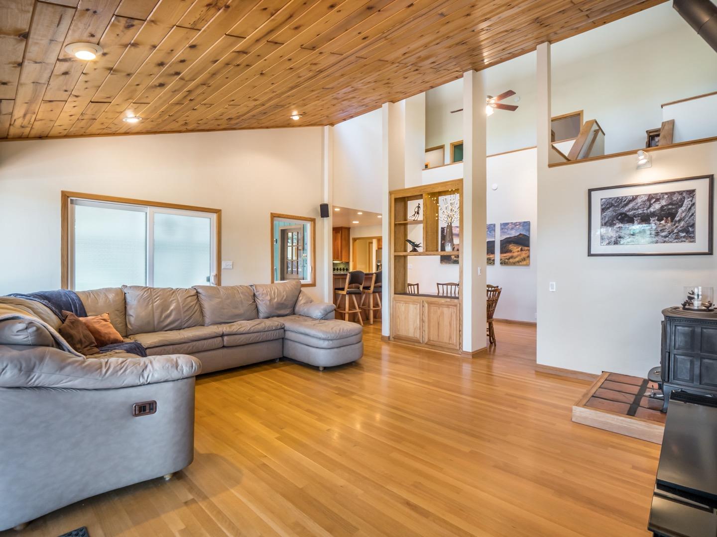 18635 Favre Ridge Road Los Gatos, CA 95033 - Photo 22 of 74 a living room with furniture and wooden floor