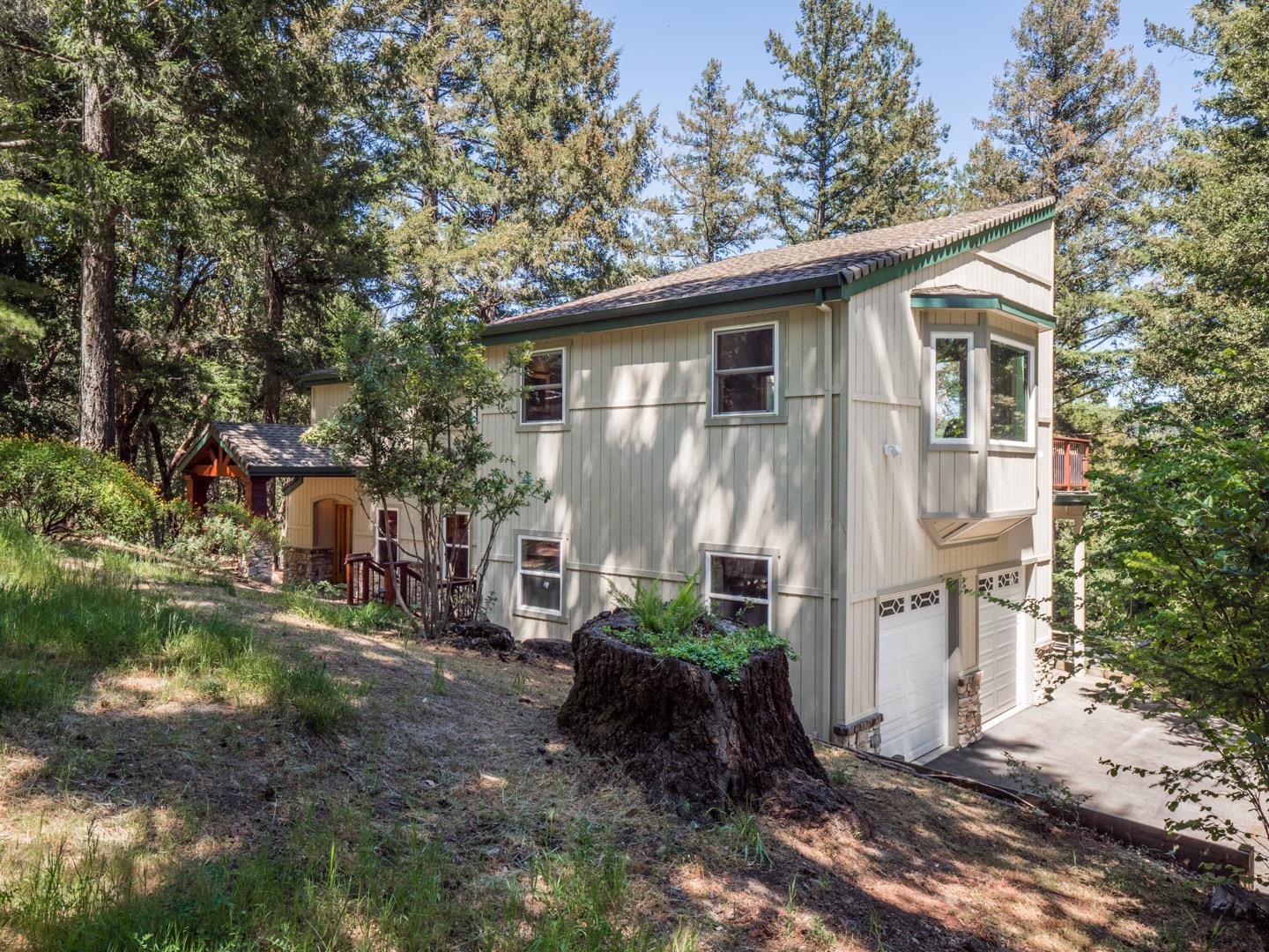 18635 Favre Ridge Road Los Gatos, CA 95033 - Photo 4 of 74 a view of a house with a yard