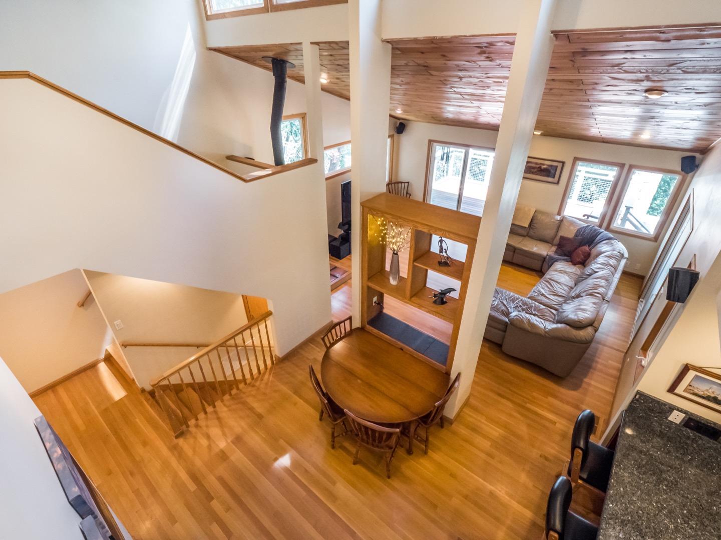 18635 Favre Ridge Road Los Gatos, CA 95033 - Photo 37 of 74 a view of a living room with furniture and wooden floor