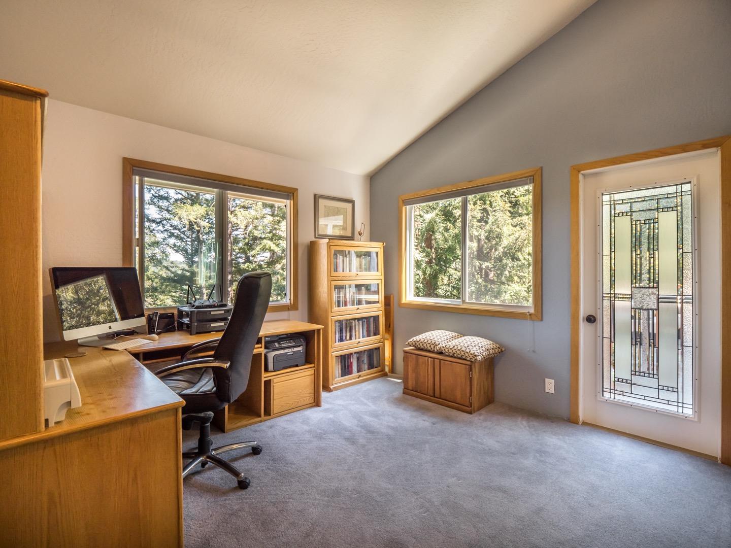 18635 Favre Ridge Road Los Gatos, CA 95033 - Photo 54 of 74 a view of a workspace with furniture and a window