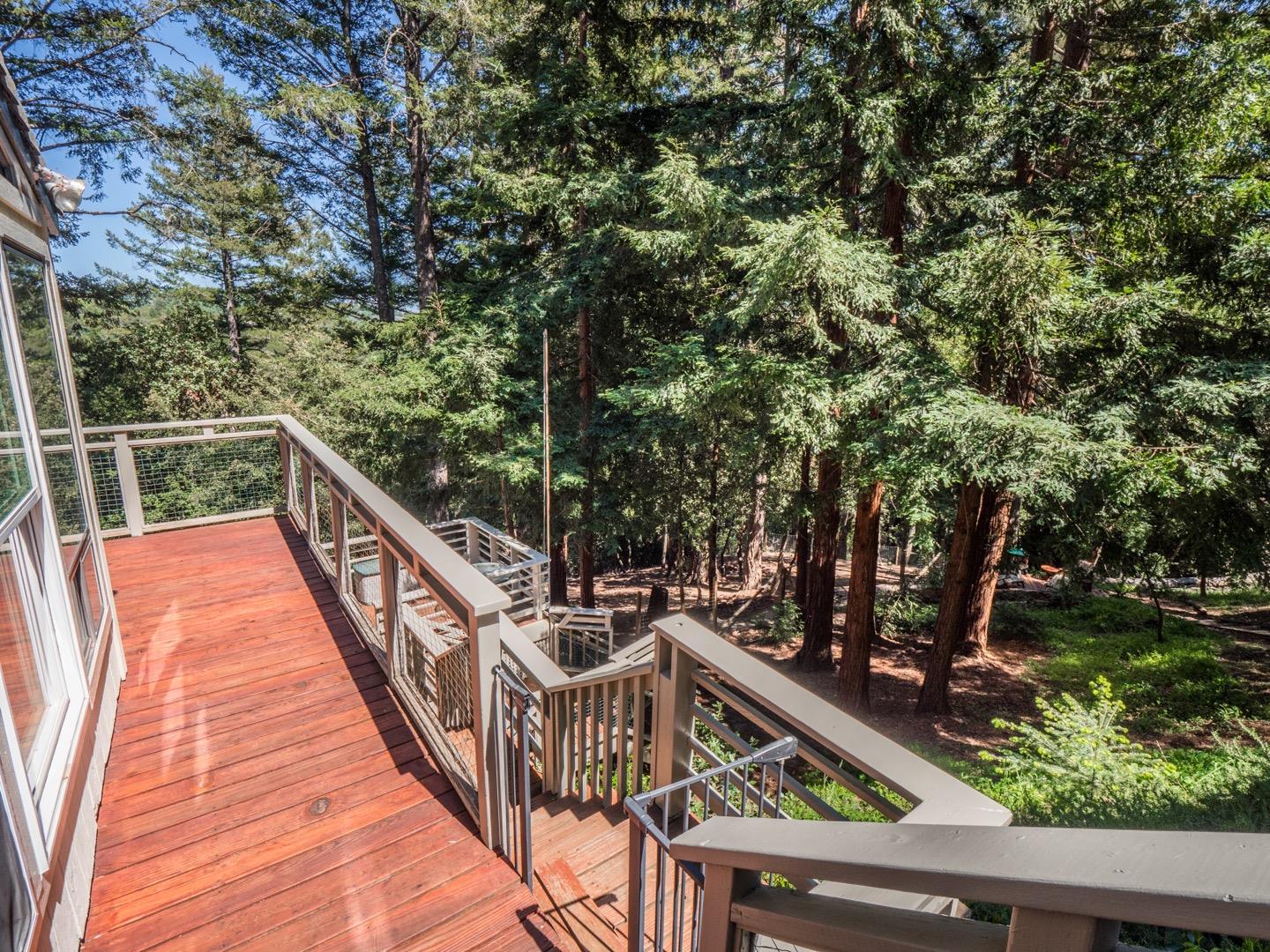 18635 Favre Ridge Road Los Gatos, CA 95033 - Photo 60 of 74 a view of deck with mountain view and trees