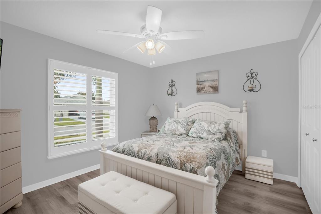 3782 Arlington Ridge Boulevard Leesburg, FL 34748 - Photo 17 of 52 a bedroom with a bed and a window