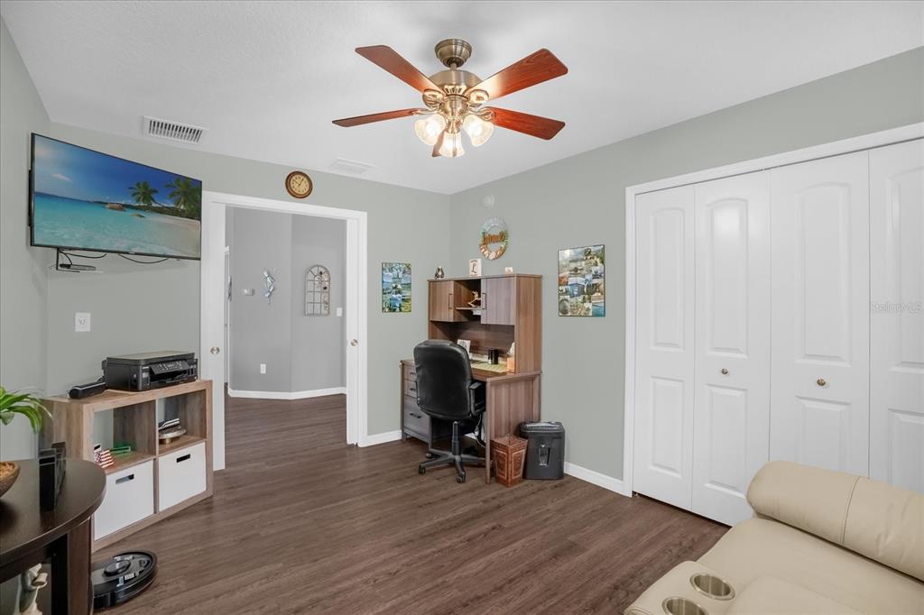 3782 Arlington Ridge Boulevard Leesburg, FL 34748 - Photo 19 of 52 a living room with furniture and a flat screen tv