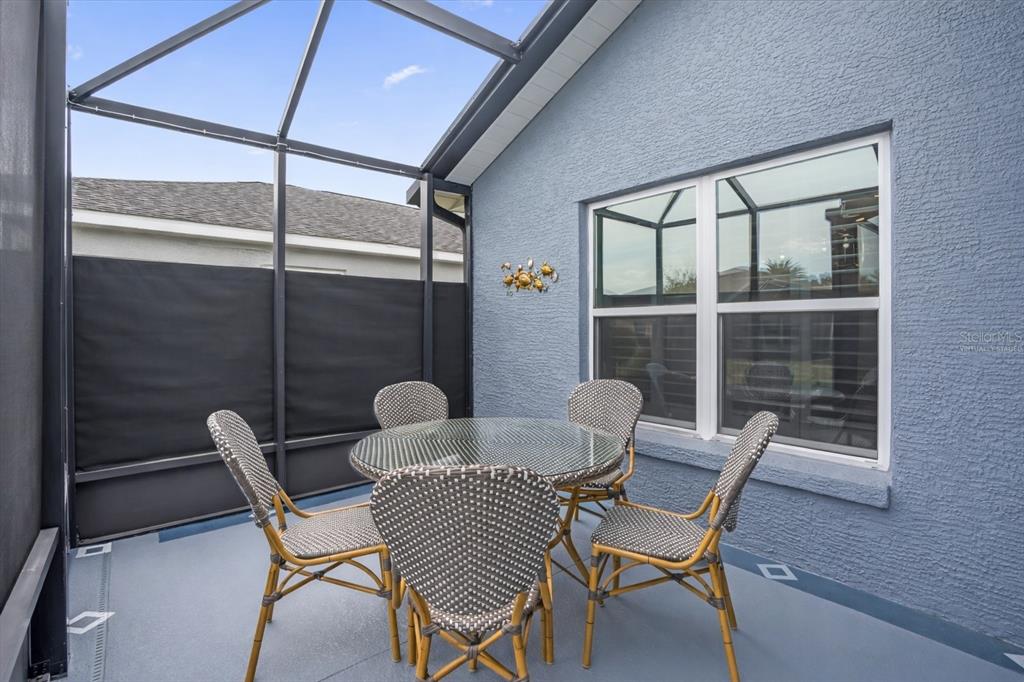 3782 Arlington Ridge Boulevard Leesburg, FL 34748 - Photo 23 of 52 a dining room with furniture and window