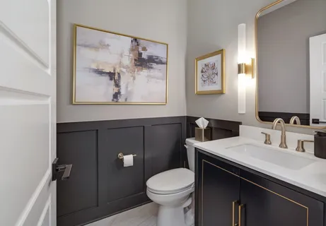 a view of a livingroom with furniture hardwood floor and a ceiling fan