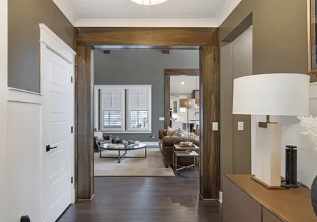a view of living room with furniture and wooden floor