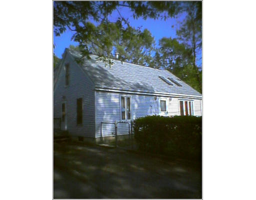 235 Gresham Street Springfield, MA 01119 - Photo 1 of 7 a view of a house with a yard
