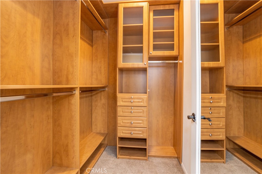 20335 Paseo Meriana Porter Ranch, CA 91326 - Photo 19 of 58 Primary Closet with Custom Build-Out by Closet World and New Carpet