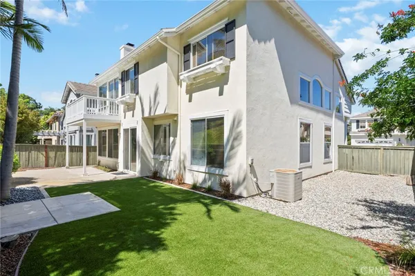 a view of house with yard