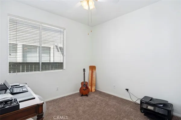 a room with furniture and a window