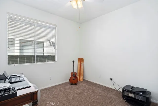 a room with furniture and a window
