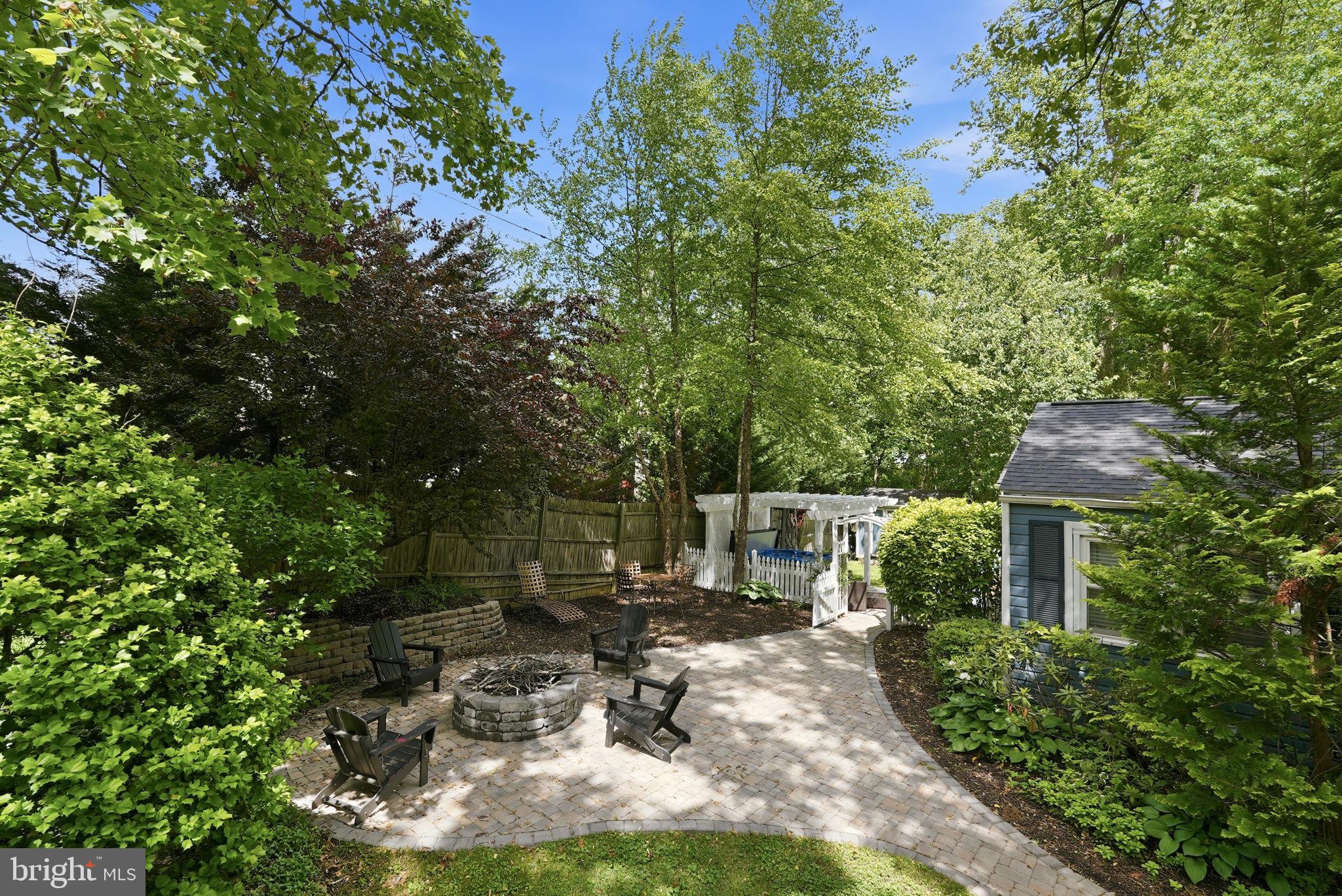 7309 Neuman Street Springfield, VA 22150 - Photo 2 of 33 fire pit area with paver patio