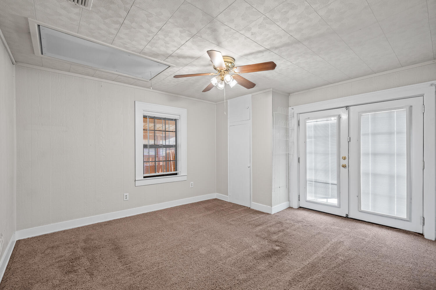 2313 20th Street Lubbock, TX 79411 - Photo 16 of 21 a view of an empty room with a window