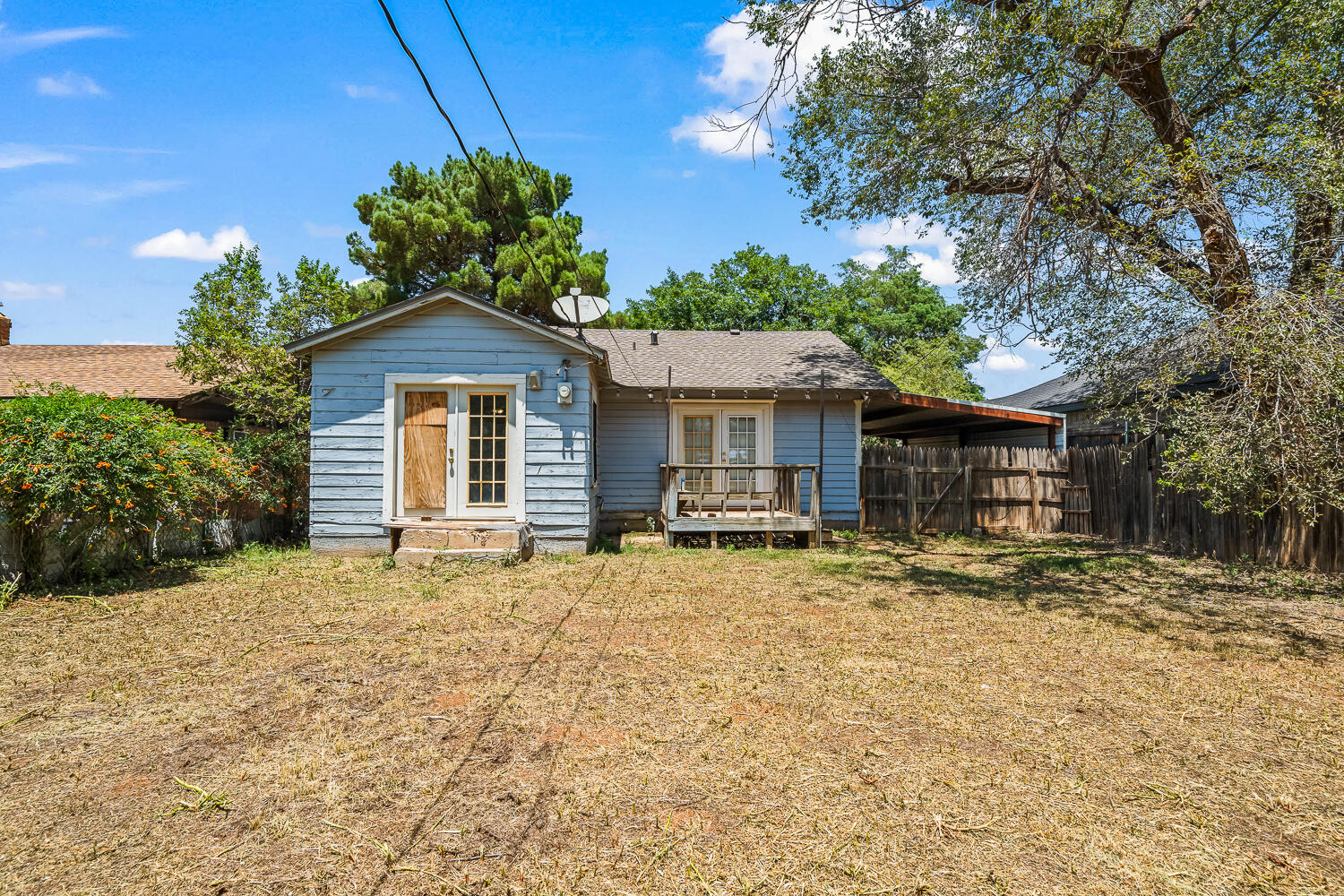 2313 20th Street Lubbock, TX 79411 - Photo 18 of 21 a front view of a house with a garden