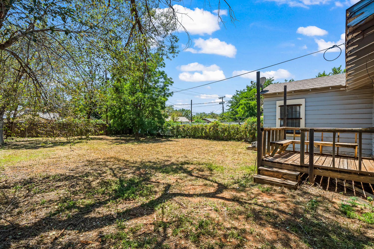 2313 20th Street Lubbock, TX 79411 - Photo 20 of 21 a view of a backyard