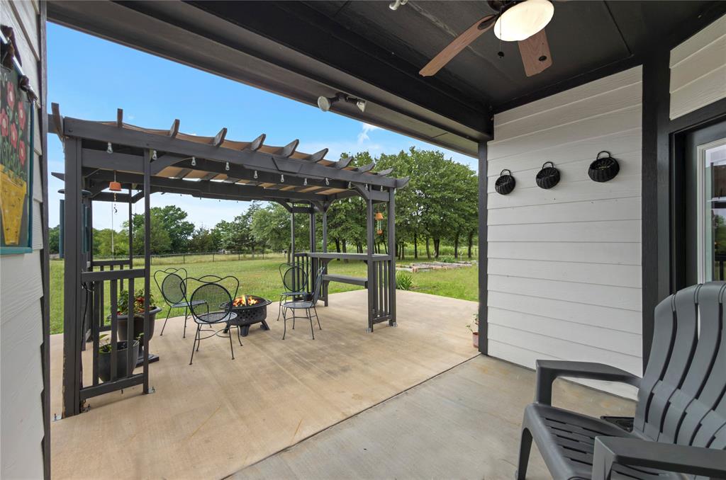 6093 Farm To Market Road 730 North Decatur, TX 76234 - Photo 21 of 28 a view of a chairs and tables in the patio