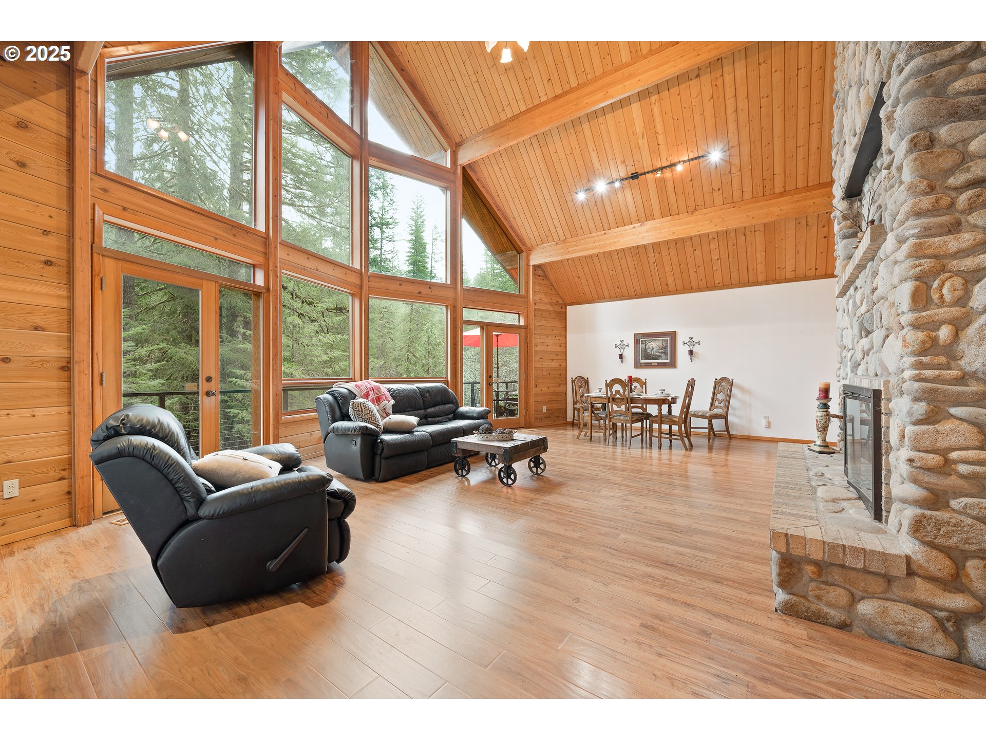 1261 Mathews Road Washougal, WA 98671 - Photo 11 of 42 a living room with furniture and a large window