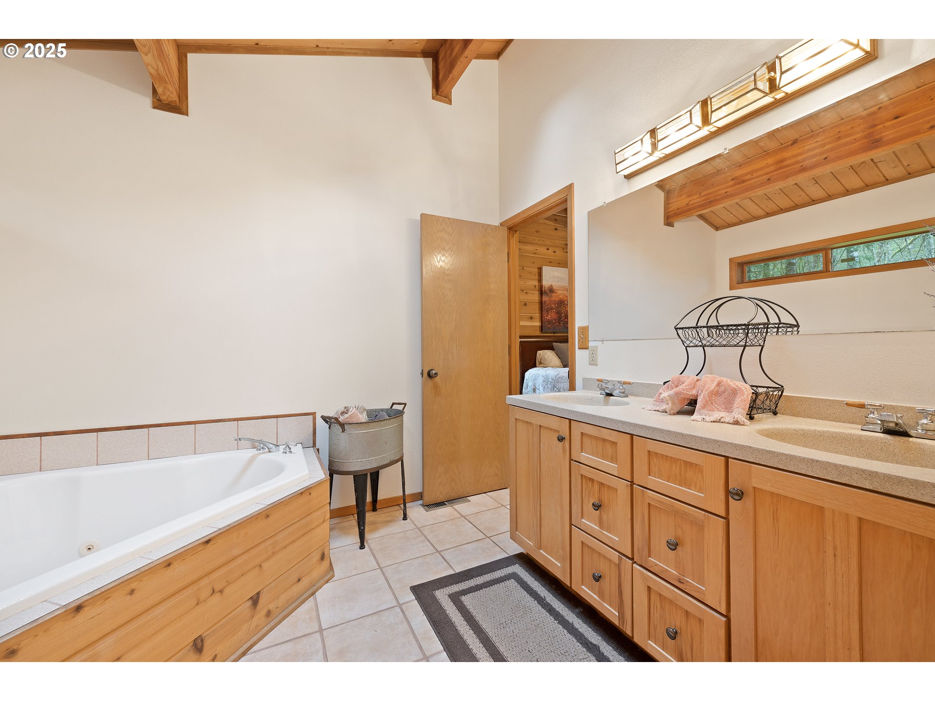 1261 Mathews Road Washougal, WA 98671 - Photo 14 of 42 a bathroom with a sink and a mirror