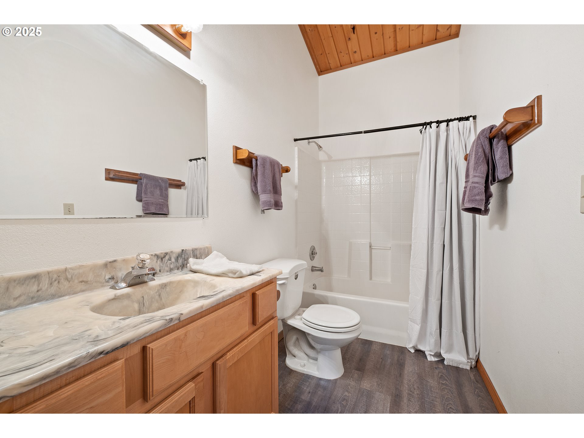 1261 Mathews Road Washougal, WA 98671 - Photo 17 of 42 a bathroom with a granite countertop sink toilet and shower