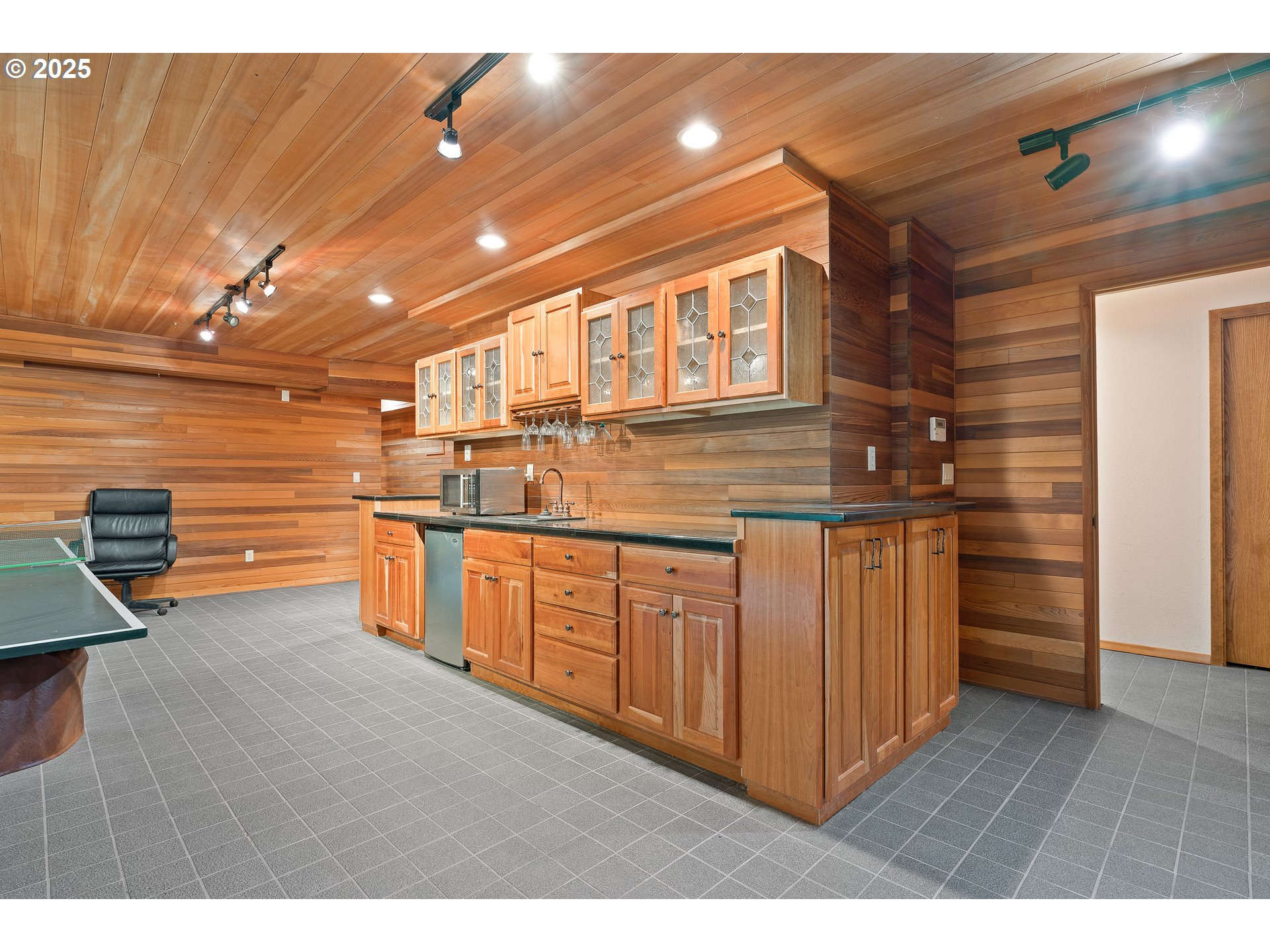 1261 Mathews Road Washougal, WA 98671 - Photo 20 of 42 a kitchen with stainless steel appliances granite countertop a sink and cabinets