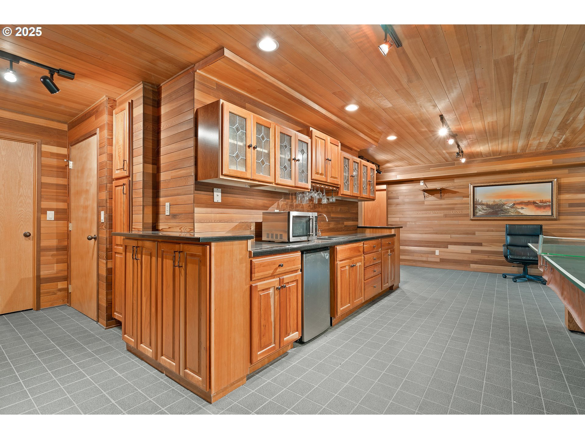 1261 Mathews Road Washougal, WA 98671 - Photo 21 of 42 a kitchen with stainless steel appliances a sink and cabinets