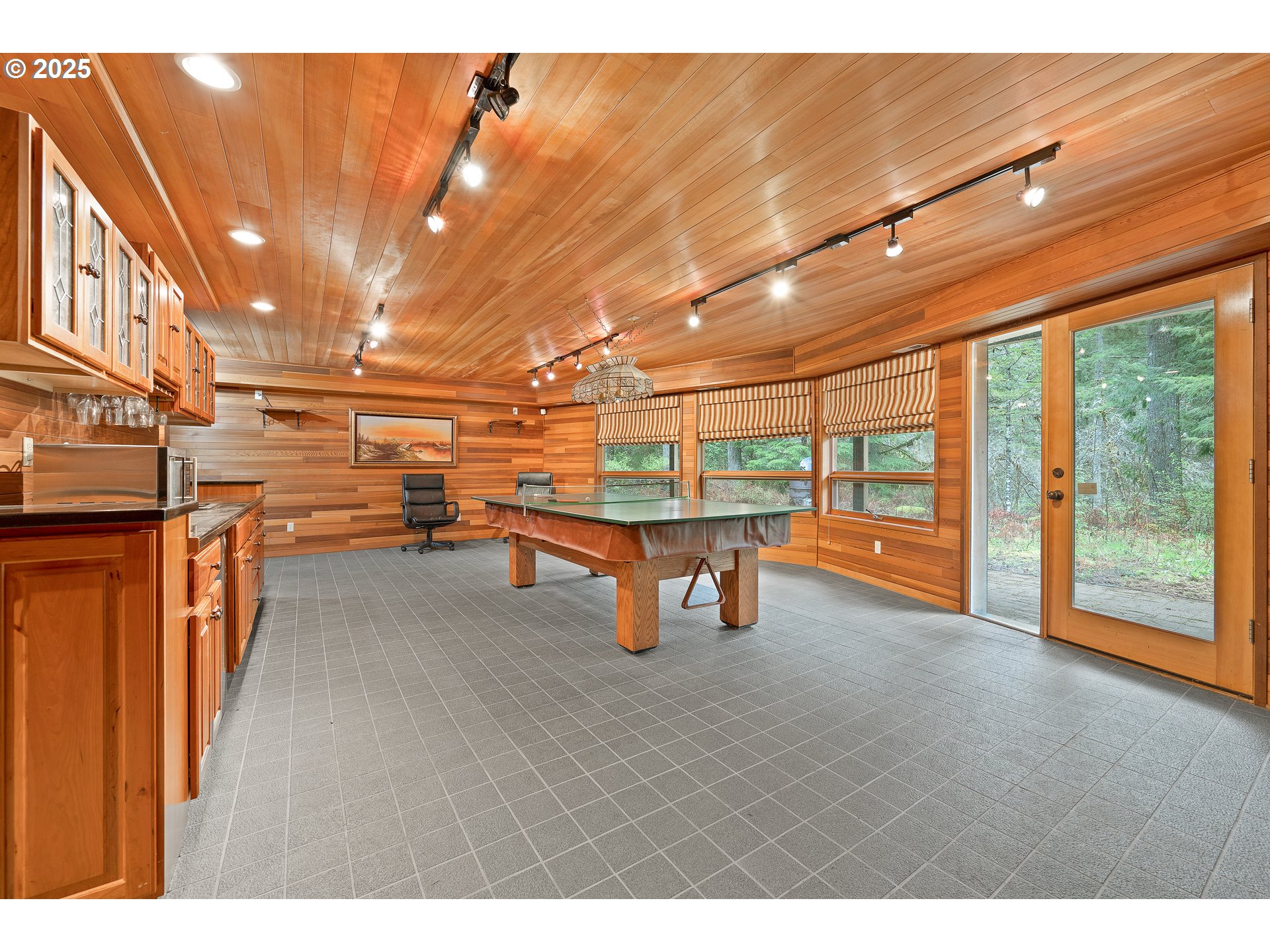 1261 Mathews Road Washougal, WA 98671 - Photo 23 of 42 a room with lots of wooden cabinets