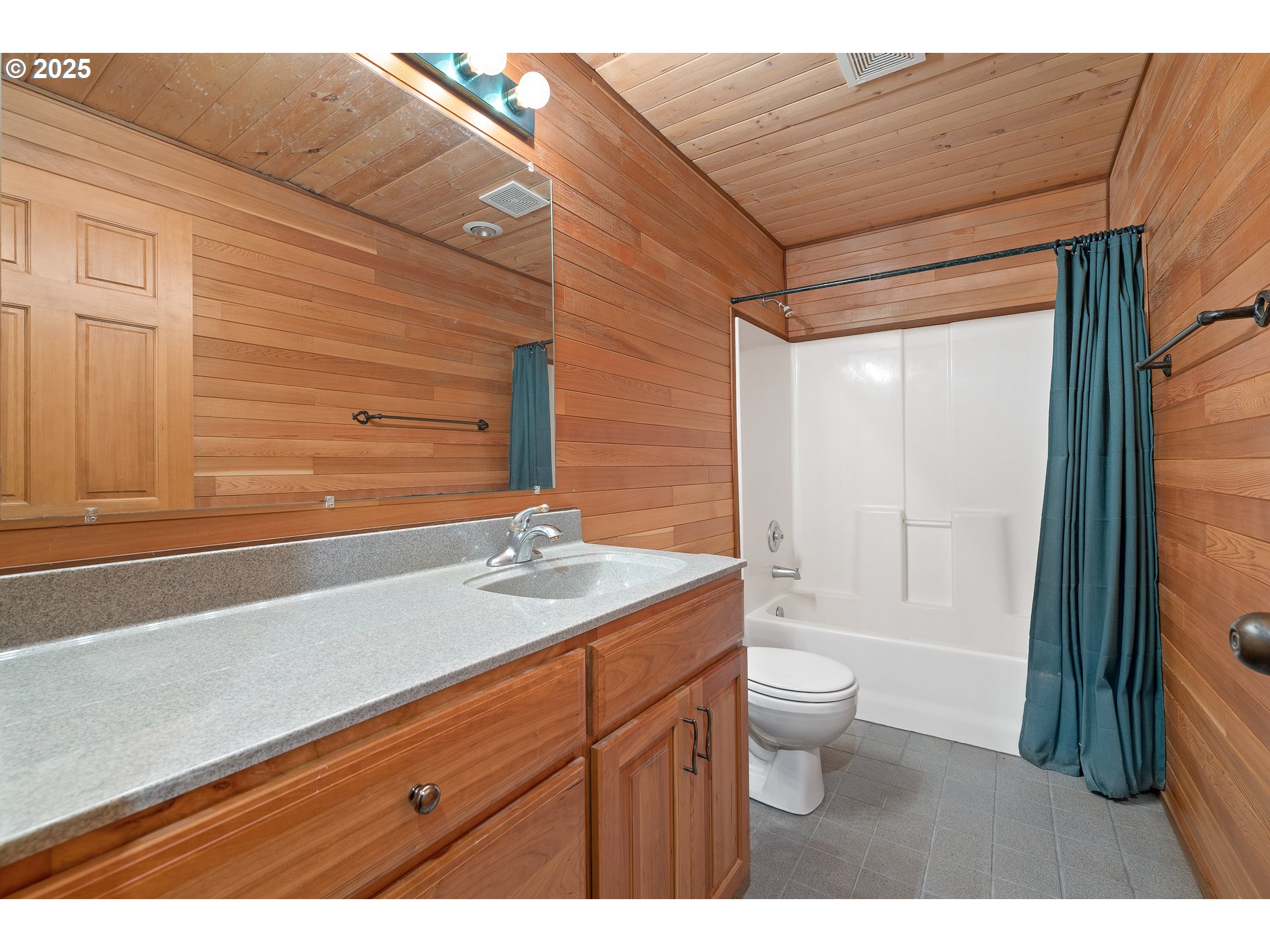 1261 Mathews Road Washougal, WA 98671 - Photo 26 of 42 a bathroom with a sink a toilet and shower