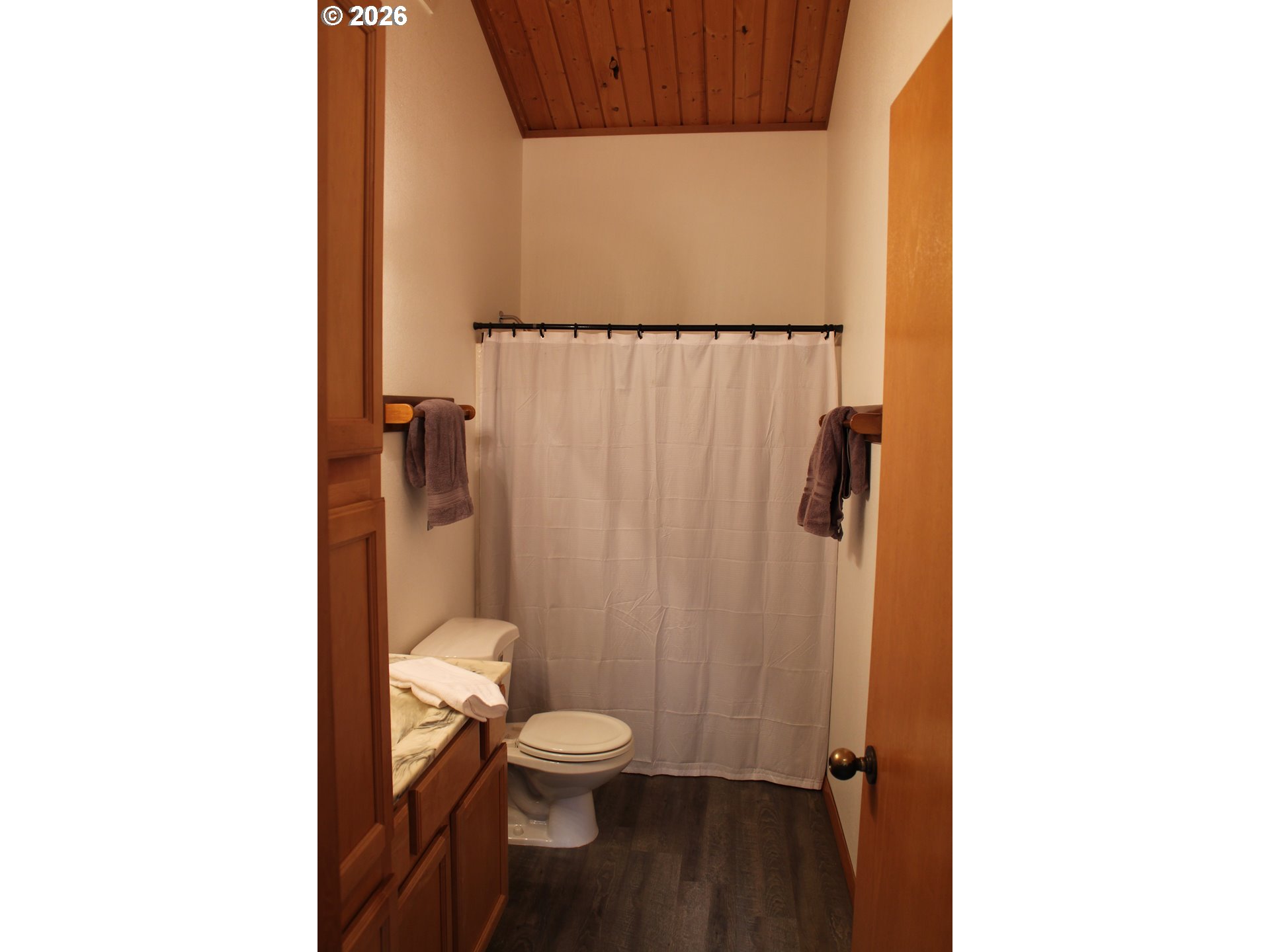 1261 Mathews Road Washougal, WA 98671 - Photo 38 of 42 a bathroom with a toilet and a shower