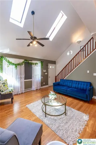 a room with furniture and a chandelier