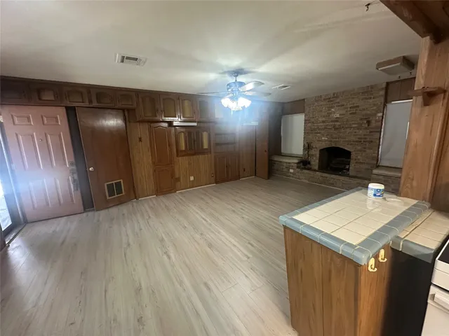 a view of a livingroom with a fireplace