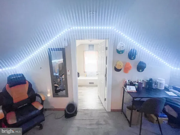 a kitchen with a sink a stove and a refrigerator