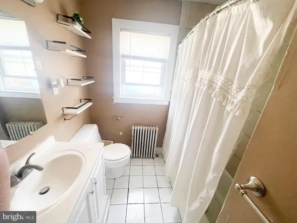 a aerial view of a house with a yard