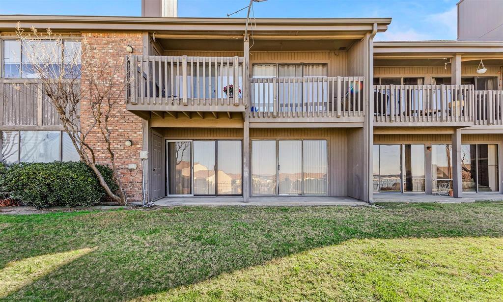925 Signal Ridge Place Rockwall, TX 75032 - Photo 20 of 21 a view of a house with a yard and deck