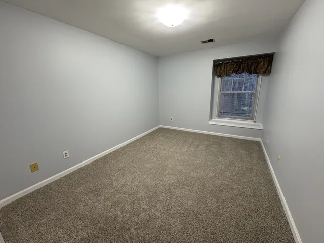 an empty room with a natural light