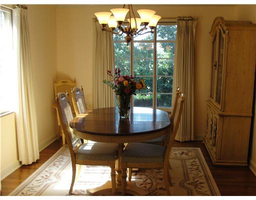 1203 Prospect Road Whitehall, PA 15227 - Photo 3 of 18 Dining Room. bright and spacious diining room which opens to living room crown molding original hardwood floors new chandelier 2006 marble window sils a pleasure to entertain in for the holidays