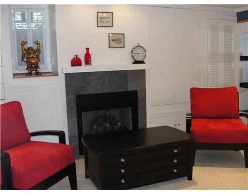 1203 Prospect Road Whitehall, PA 15227 - Photo 7 of 18 Family Room. updated family room with gas ventless fireplace Berber carpeting througjout plus wet bar mimi refrigerator and stools great for relaxation and entertaining