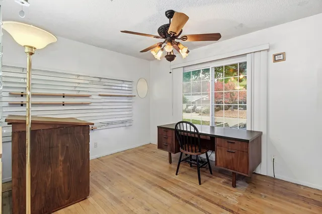 a workspace with wooden floor